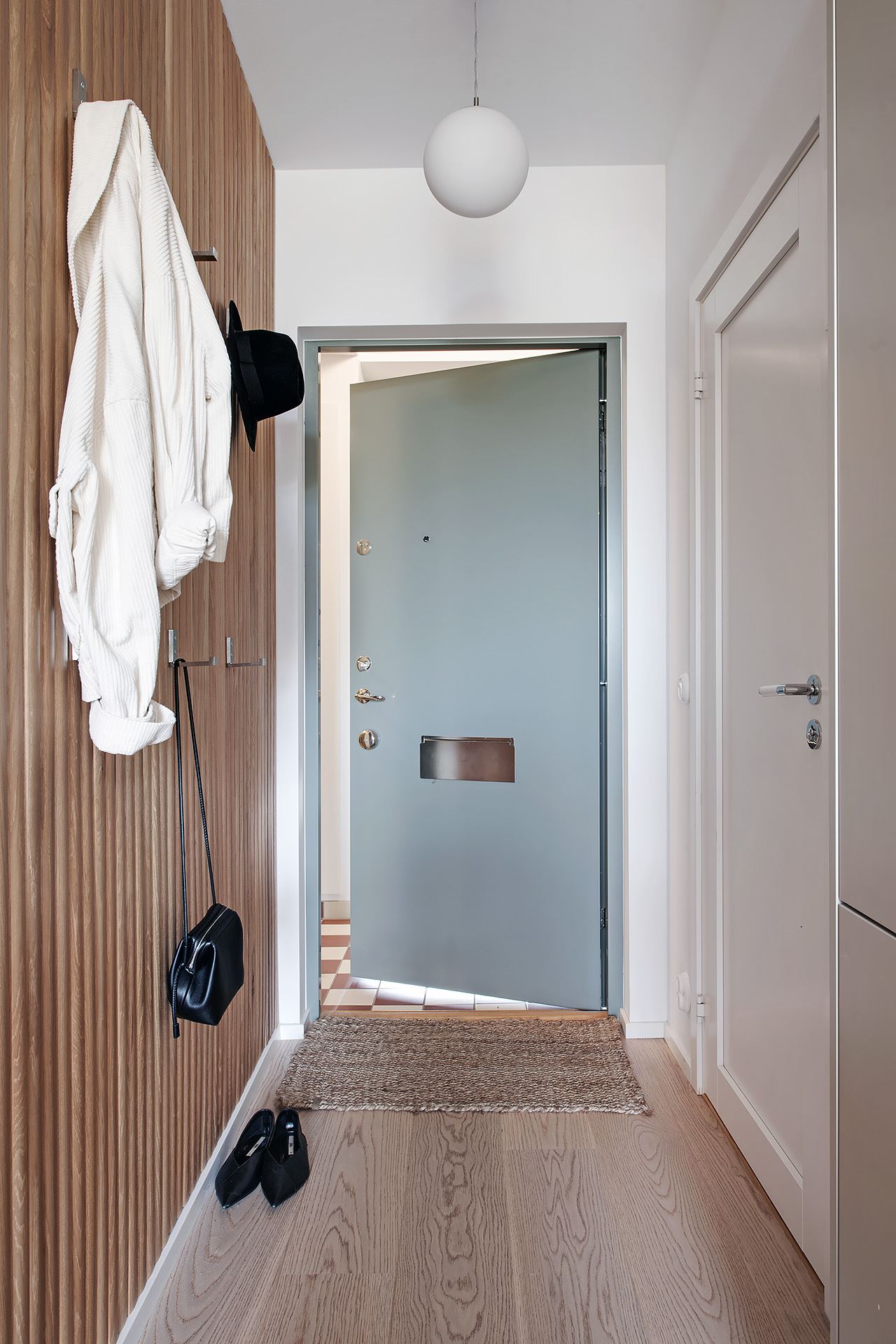 entrée avec mur bois