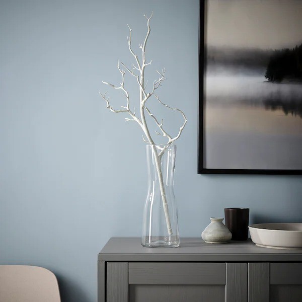 vase en verre avec branche blanche vase en verre avec branche blanche