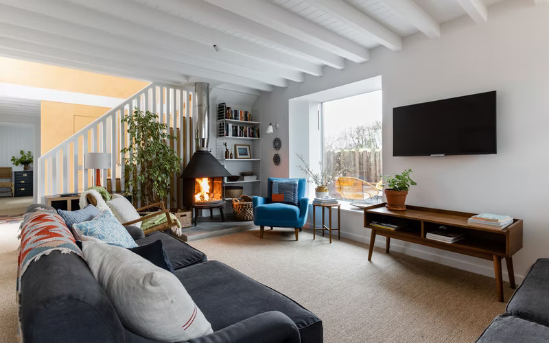 salon grange rénovée et agrandie