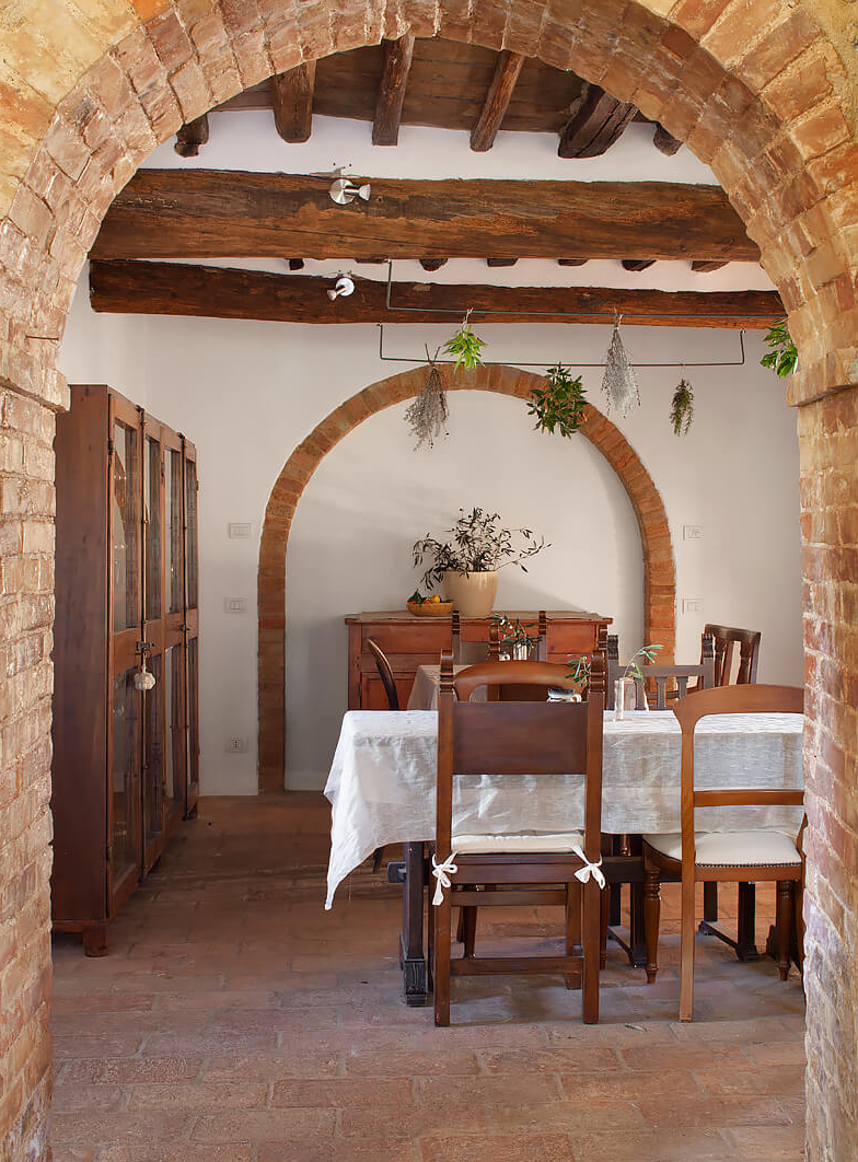 salle à manger avec arche en briques maison Toscane salle à manger avec arche en briques maison Toscane