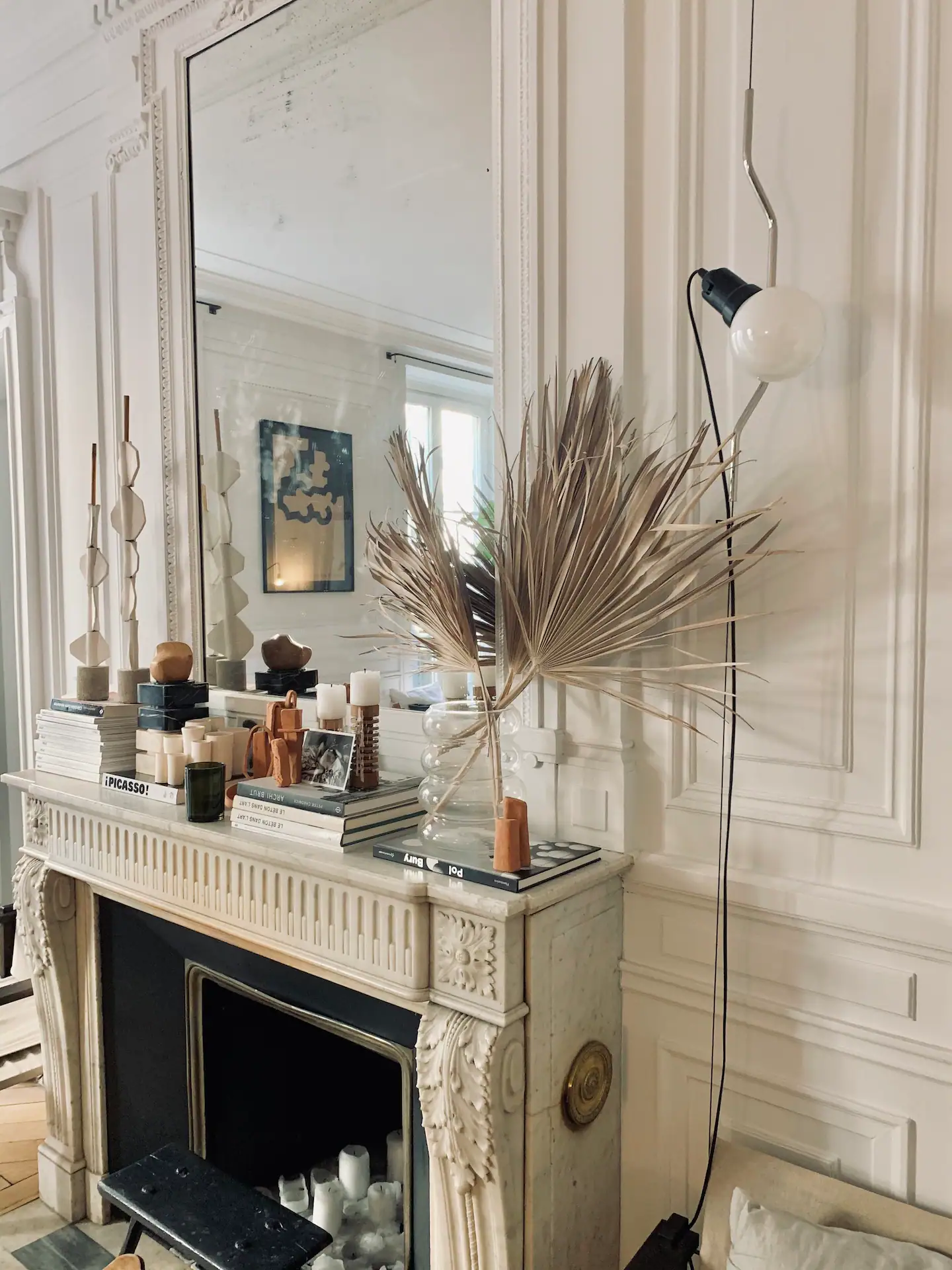 salon avec cheminée appartement haussmannien Paris