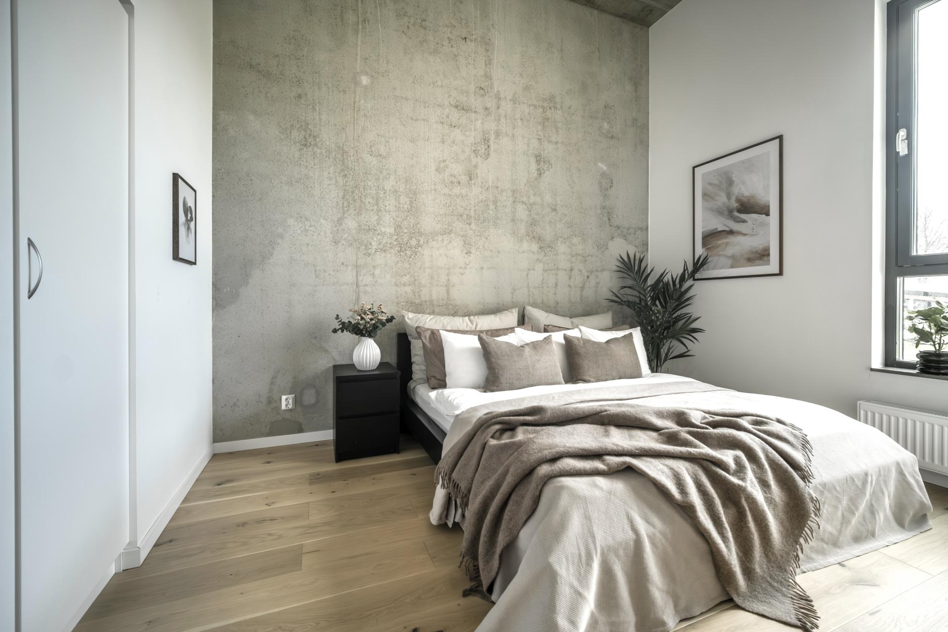 chambre murs béton mini loft 55m2
