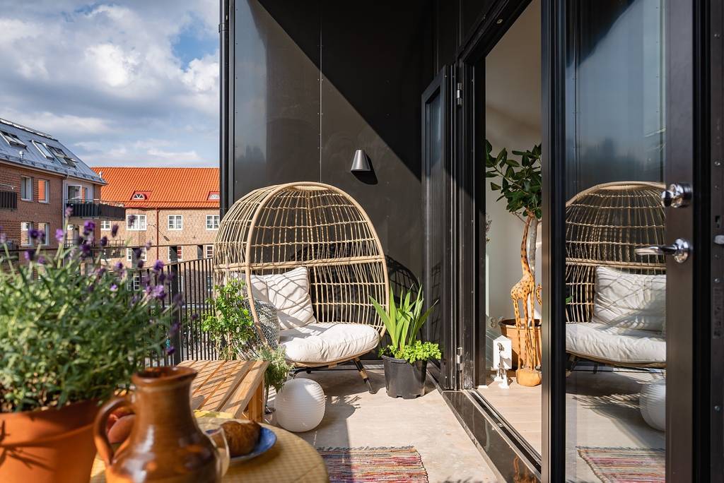 terrasse avec fauteuil suspendu
