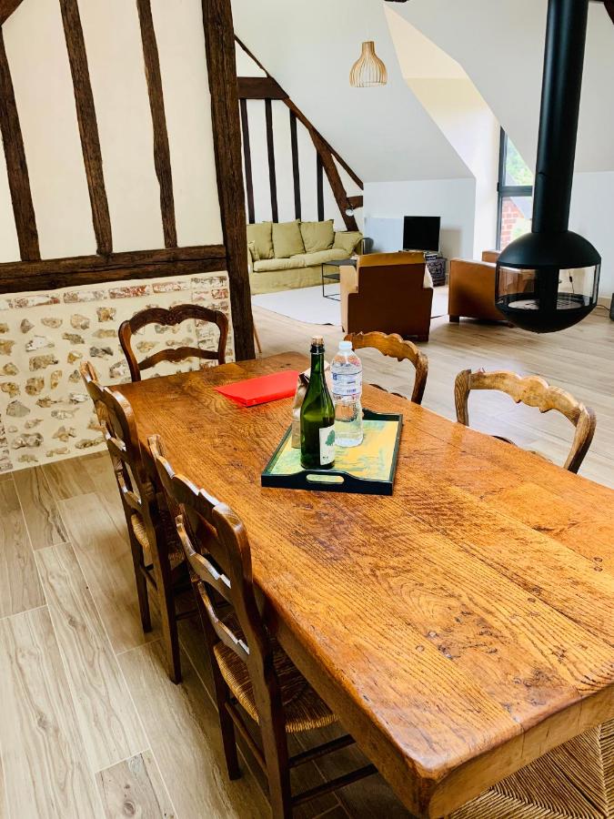 salle à manger avec colombages et cheminée Focus maison en pierres Le Clos Masure d salle à manger avec colombages et cheminée Focus maison en pierres Le Clos Masure d'Étretat