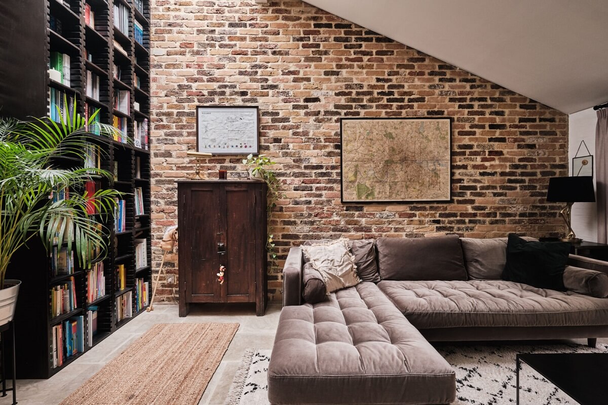 salon maison de ville style loft mur briques