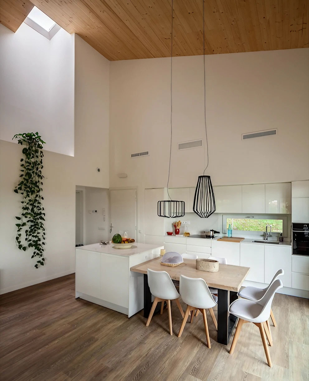 salon double hauteur maison préfabriquée et biopassive en bois House Habitat
