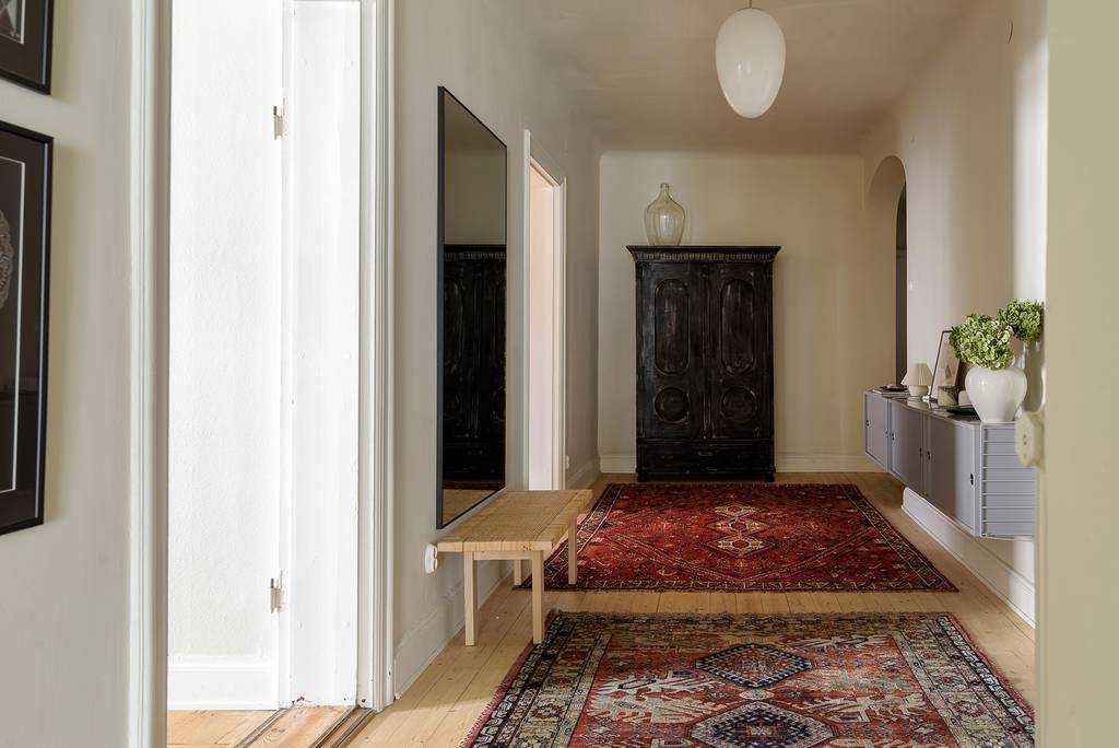 entrée avec tapis d'orient