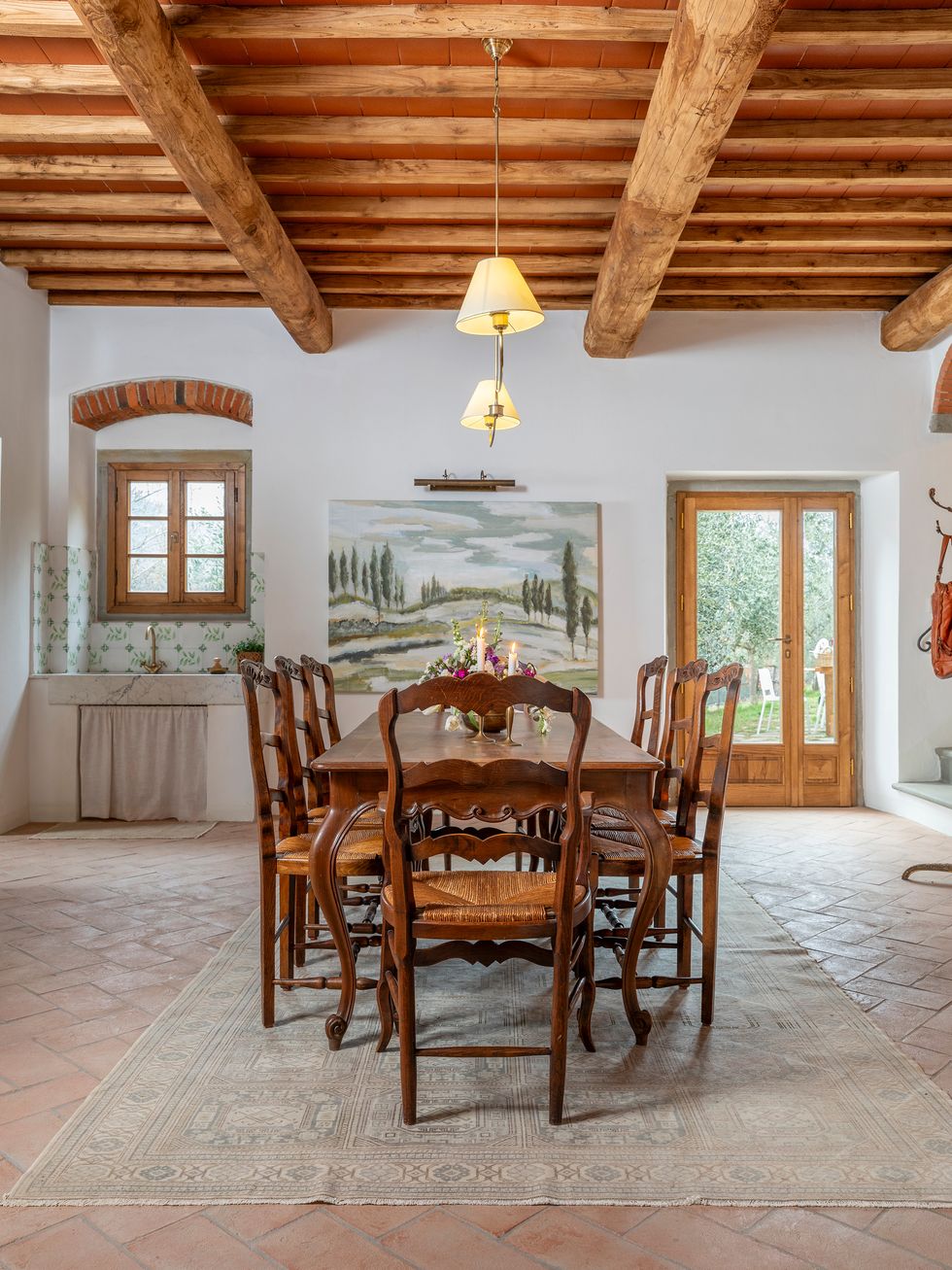 salle à manger avec poutres décoration rustique chic Campo Sasso