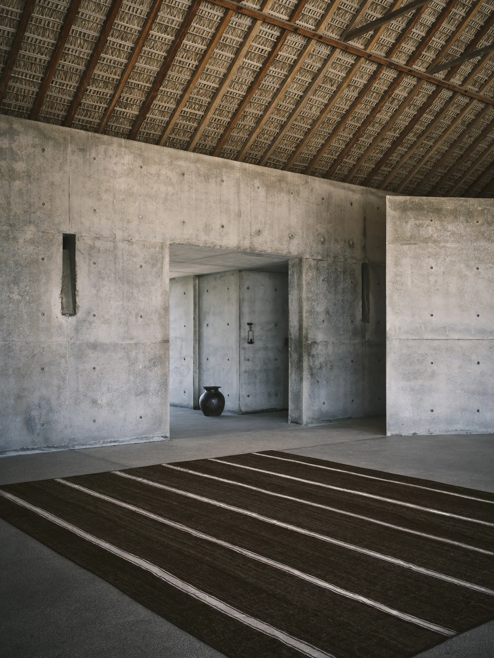 entrée maison architecte murs béton