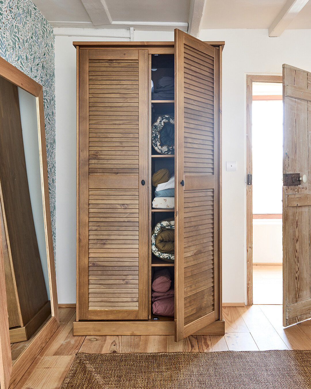 armoire bois dans chambre visite privée Alinea Reims