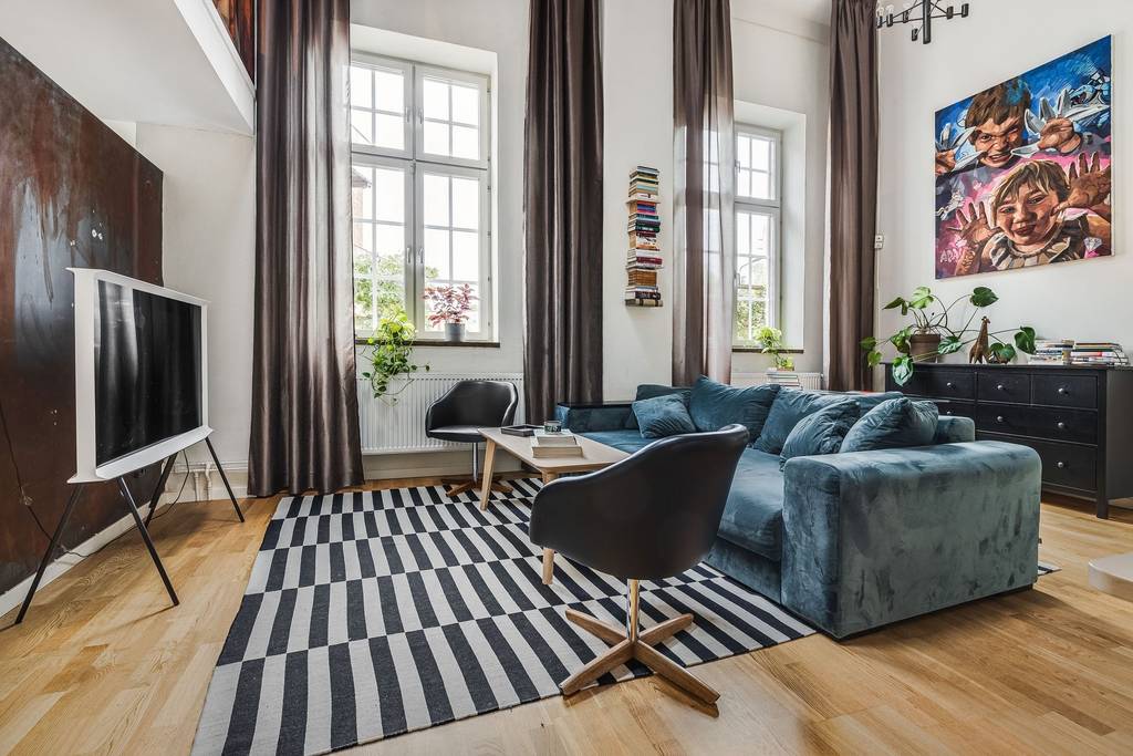 salon avec canapé bleu duplex 108m2