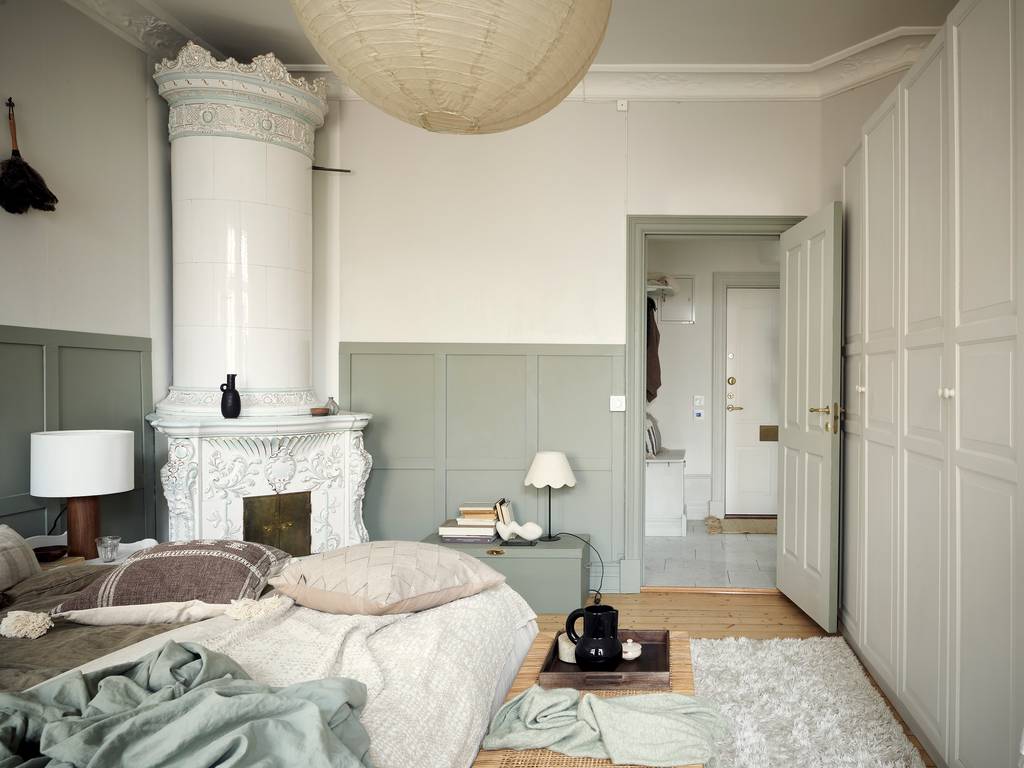chambre avec poêle scandinave décoration vert sauge appartement 80m2