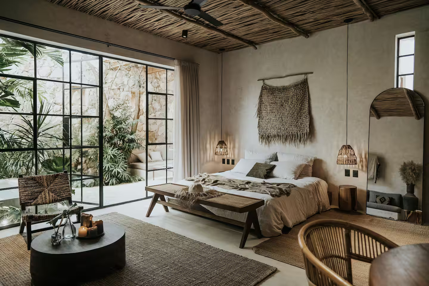 espace chambre appartement décoration naturelle avec jardin et piscine à Tulum