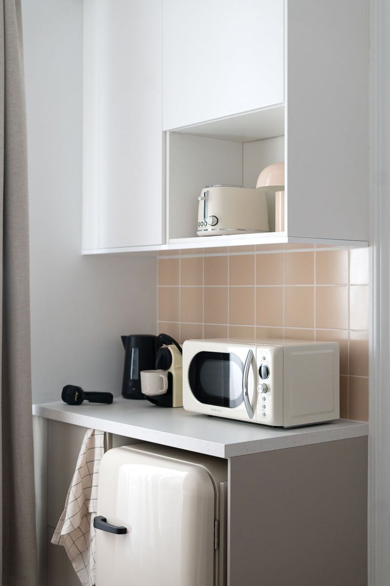 cuisine studio 12m2 Paris dans ancienne loge de gardien