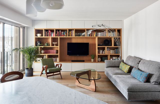 salon avec bibliothèque Houzz 2025