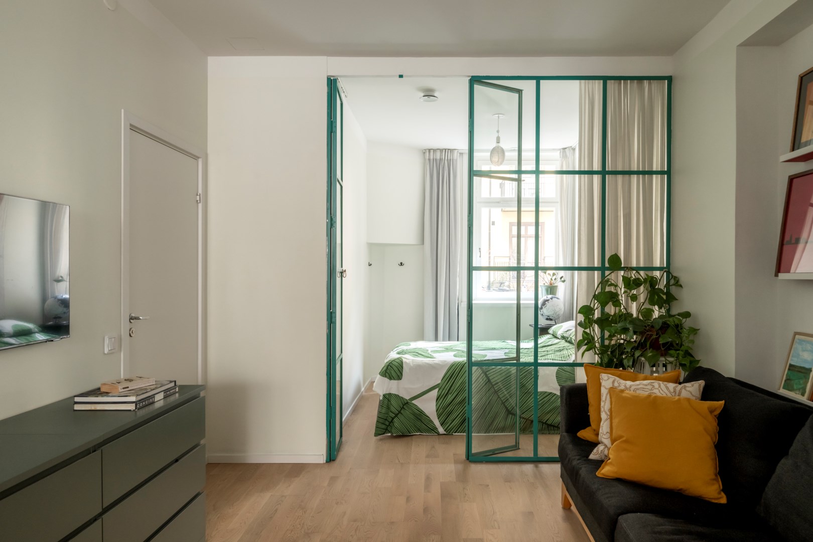 salon avec verrière verte chambre deux-pièces 57m2