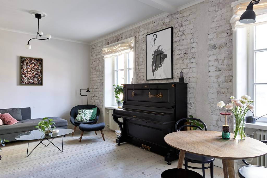 salon murs briques blanches appartement 46m2