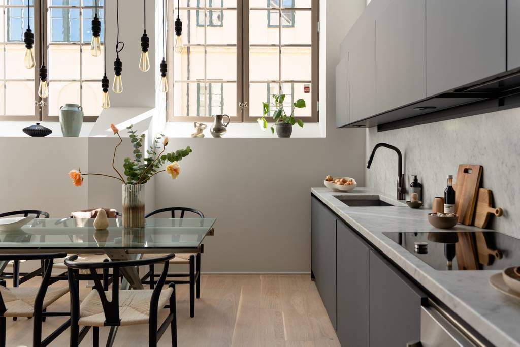 cuisine et salle à manger double hauteur appartement 100m2