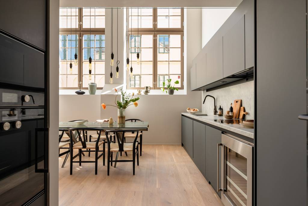 cuisine et salle à manger double hauteur appartement 100m2