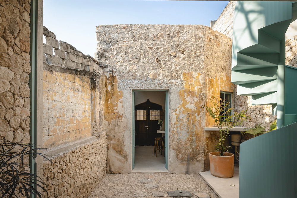 extérieur murs de pierres maison ancienne Vistalcielo Merida Mexique