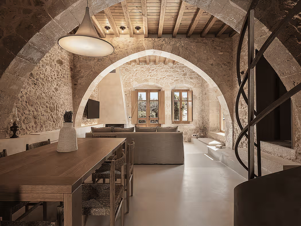 salon avec ouverture cintrée maison en pierres avec piscine en Crète Corte Interna