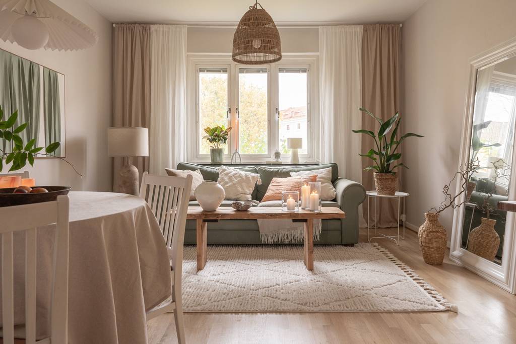 salon décoration verte et beige deux-pièces de 50m2