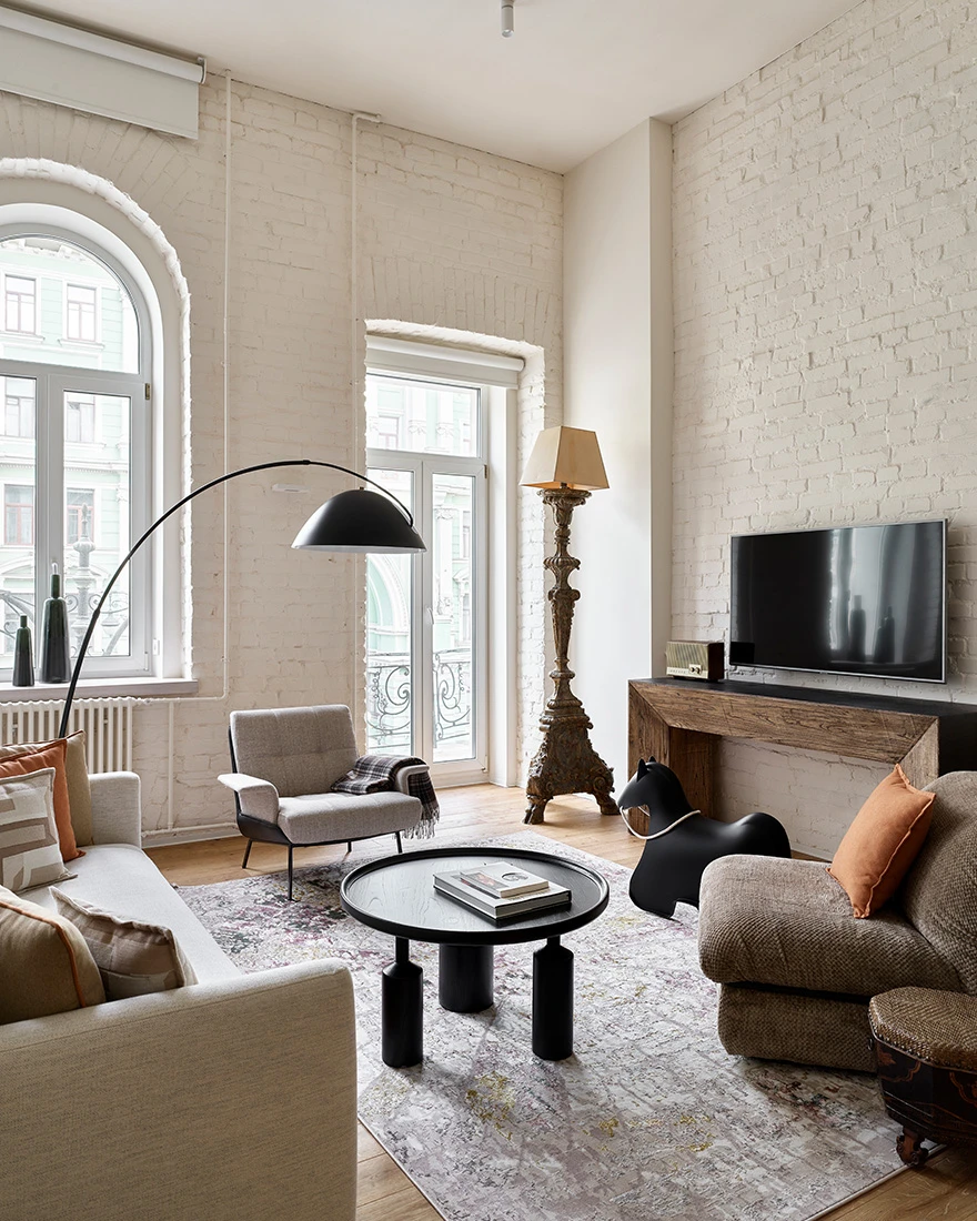 salon murs briques blanches décoration contemporaine appartement de 90m2