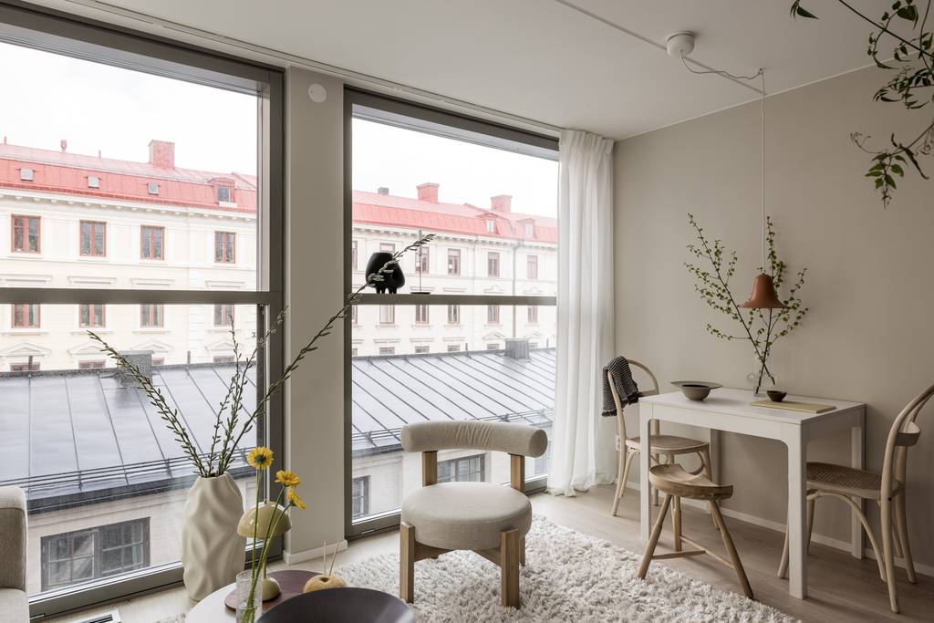 salon avec baies vitrées deux-pièces 34m2 décoration beige