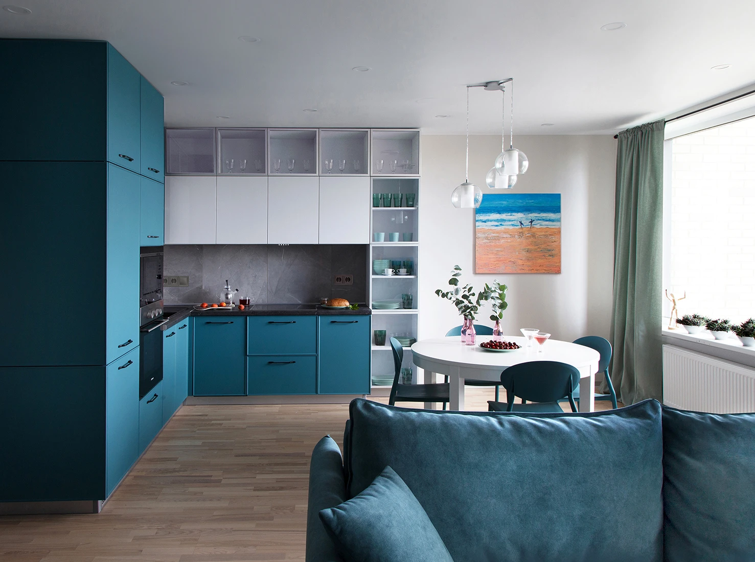 cuisine en L avec espace repas studio 50m2 avec alcôve décoration bleue cuisine en L avec espace repas studio 50m2 avec alcôve décoration bleue
