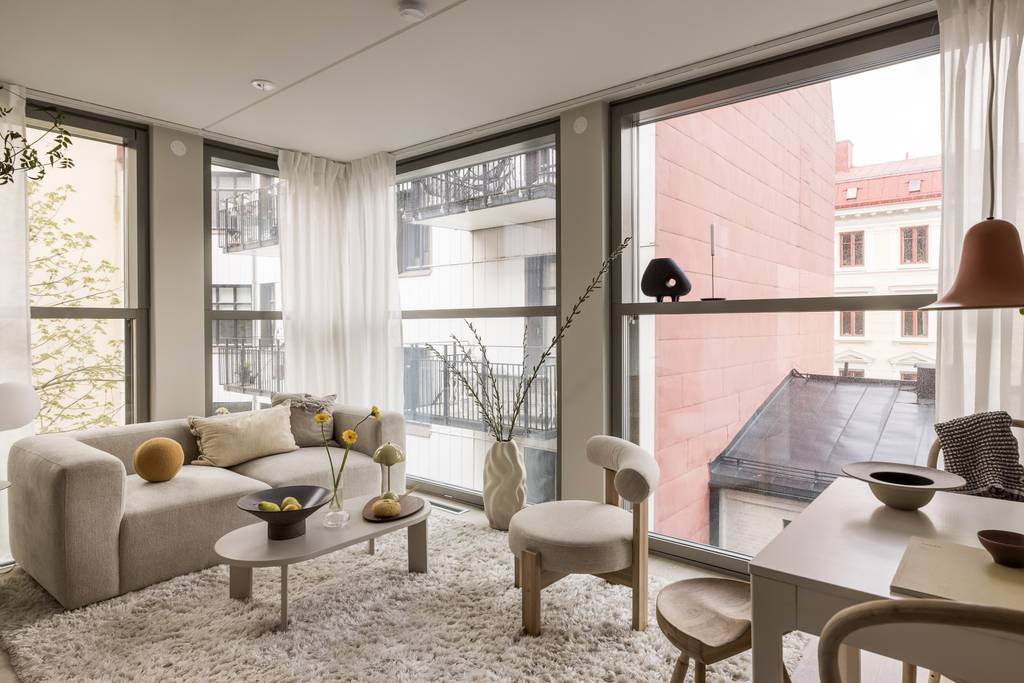 salon avec baies vitrées deux-pièces 34m2 décoration beige