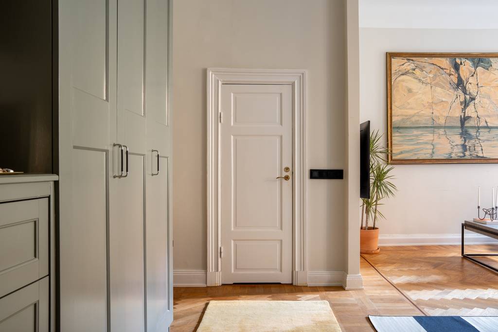 cuisine ouverte verte décoration vintage et scandinave deux-pièces 46m2