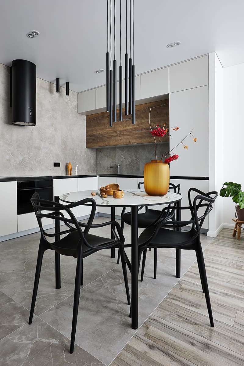 cuisine blanche en angle ouverte et salle à manger design deux-pièces 51m2