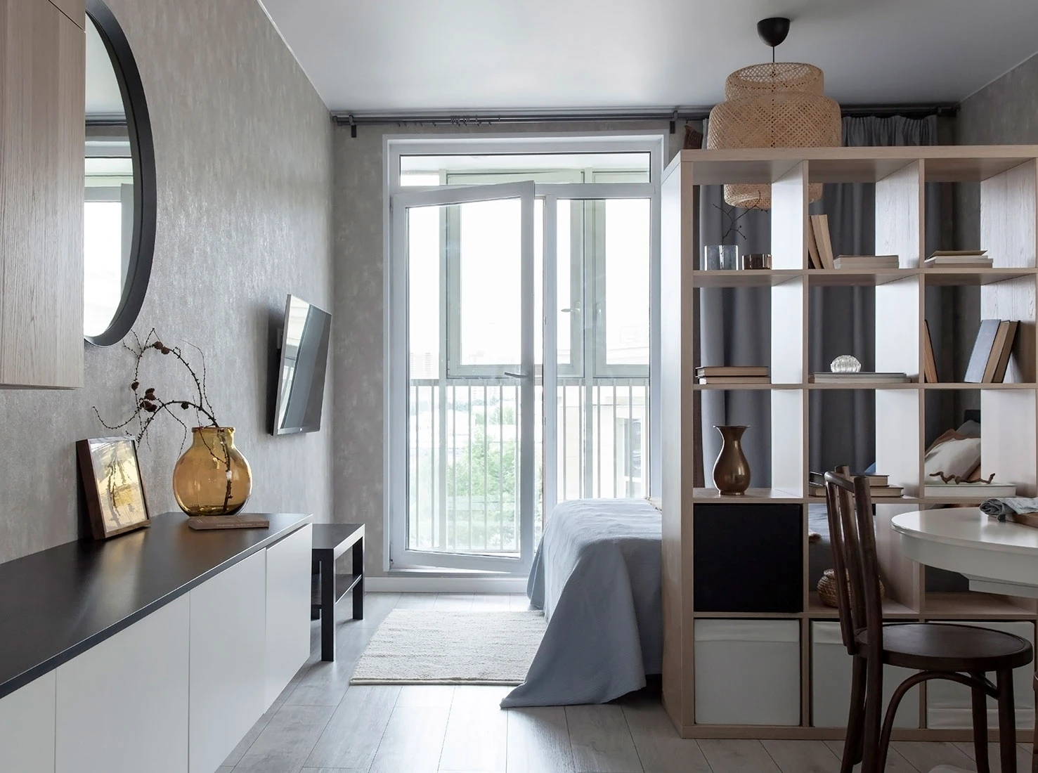 pièce principale studio 29m2 avec séparation IKEA KALLAX pour zoner la chambre