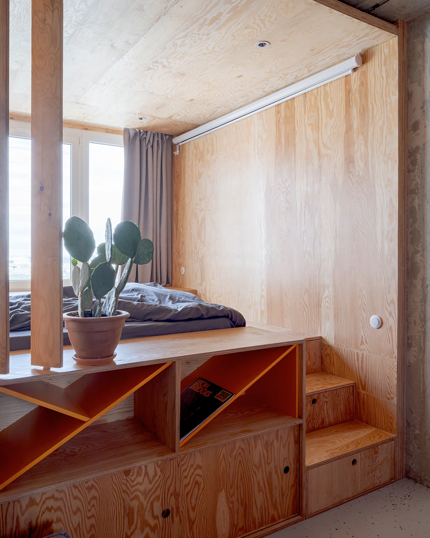 chambre sur podium avec tiroirs studio 25m2