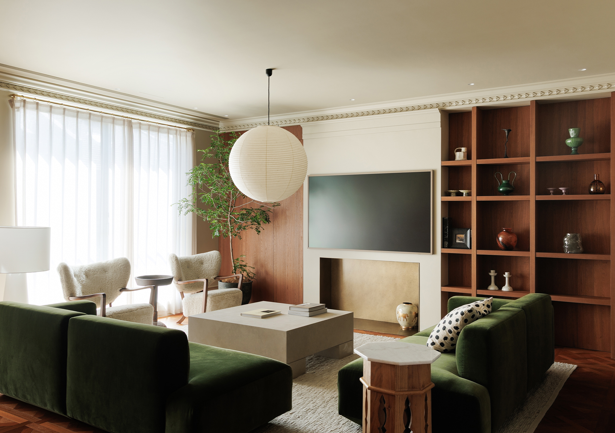 salon avec canapé vert olive décoration contemporaine appartement Pékin