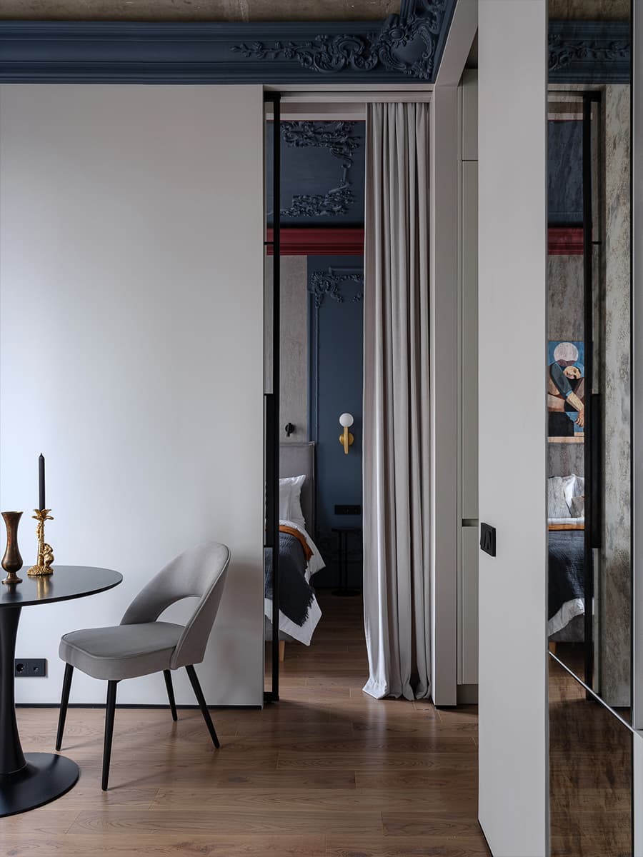chambre porte verrière et espace salle à manger design avec table pied tulipe deux-pièces de 41m2 décoration contemporaine