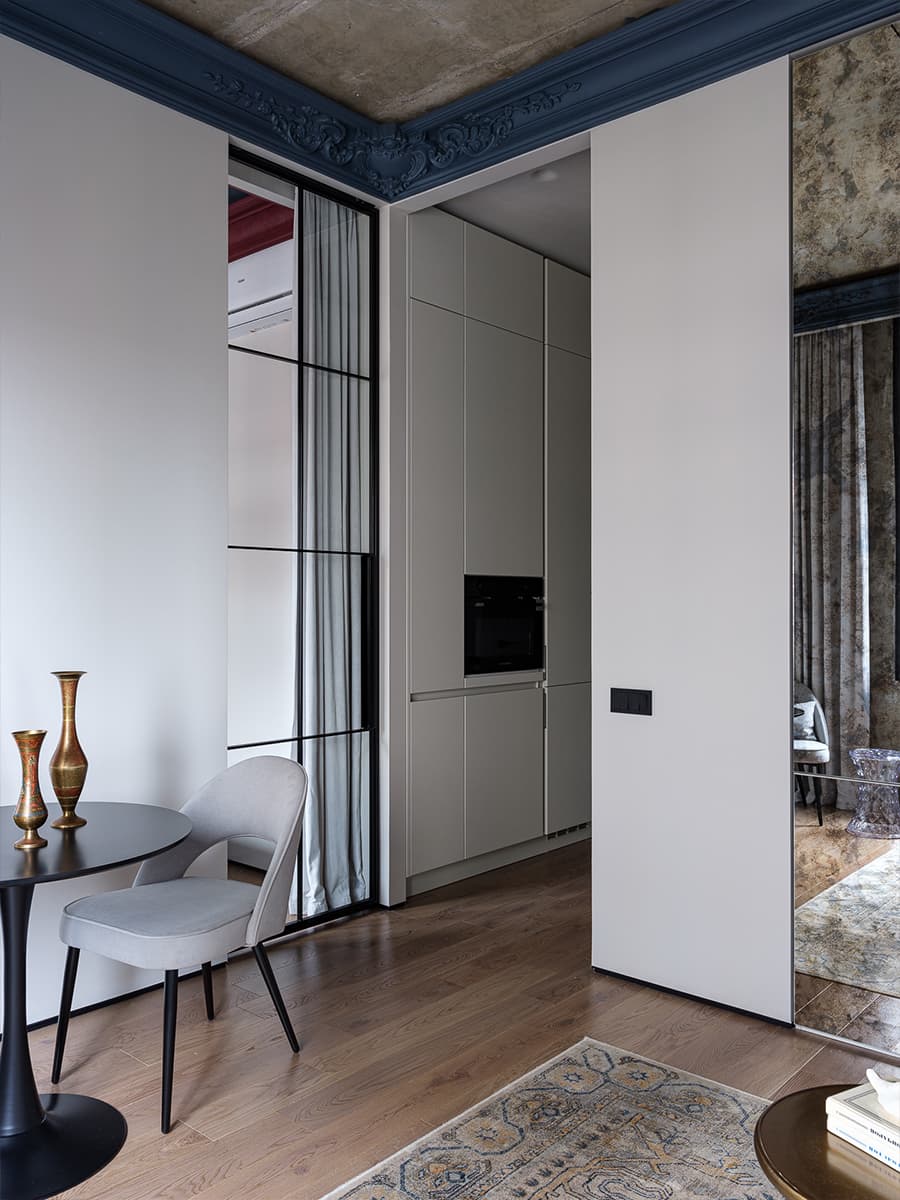 espace salle à manger design avec table pied tulipe deux-pièces de 41m2 décoration contemporaine