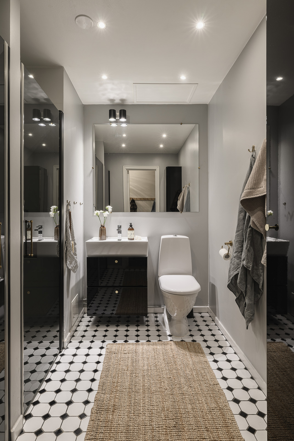 salle de bain sol cabochons noir et blanc deux-pièces 52m2 décoration scandinave