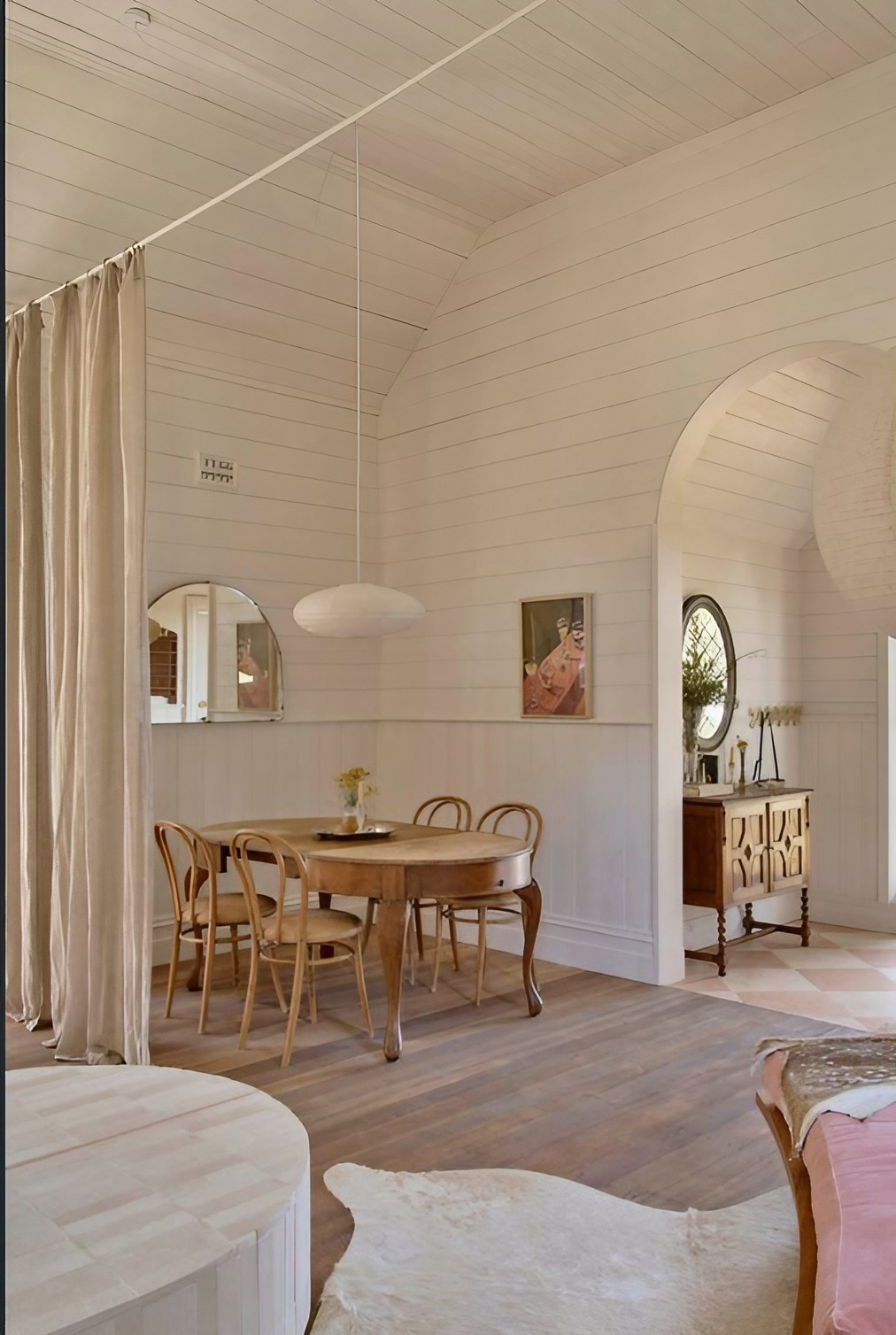 designer living room with pink sofa in a contemporary house in a former church with architect designer living room with pink sofa in a contemporary house in a former church with architect's extension