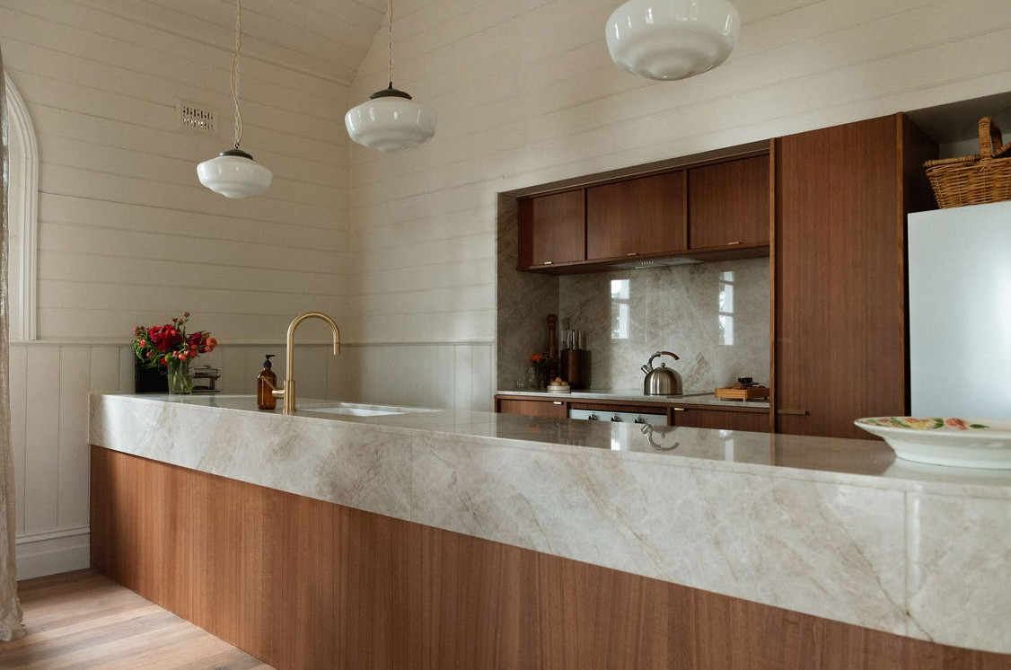modern kitchen wood and marble in a contemporary house in a former church with architect modern kitchen wood and marble in a contemporary house in a former church with architect's extension