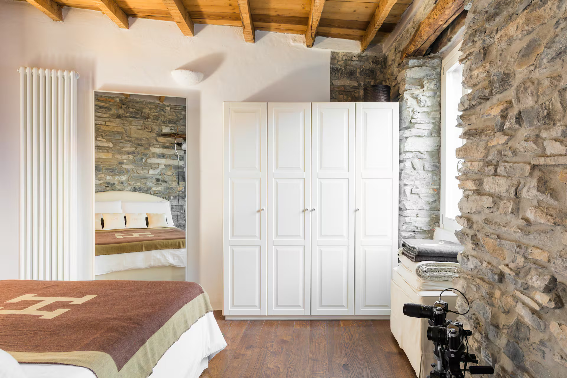 bedroom grey stone walls beams apartment Lake Como rustic chic decor bedroom grey stone walls beams apartment Lake Como rustic chic decor
