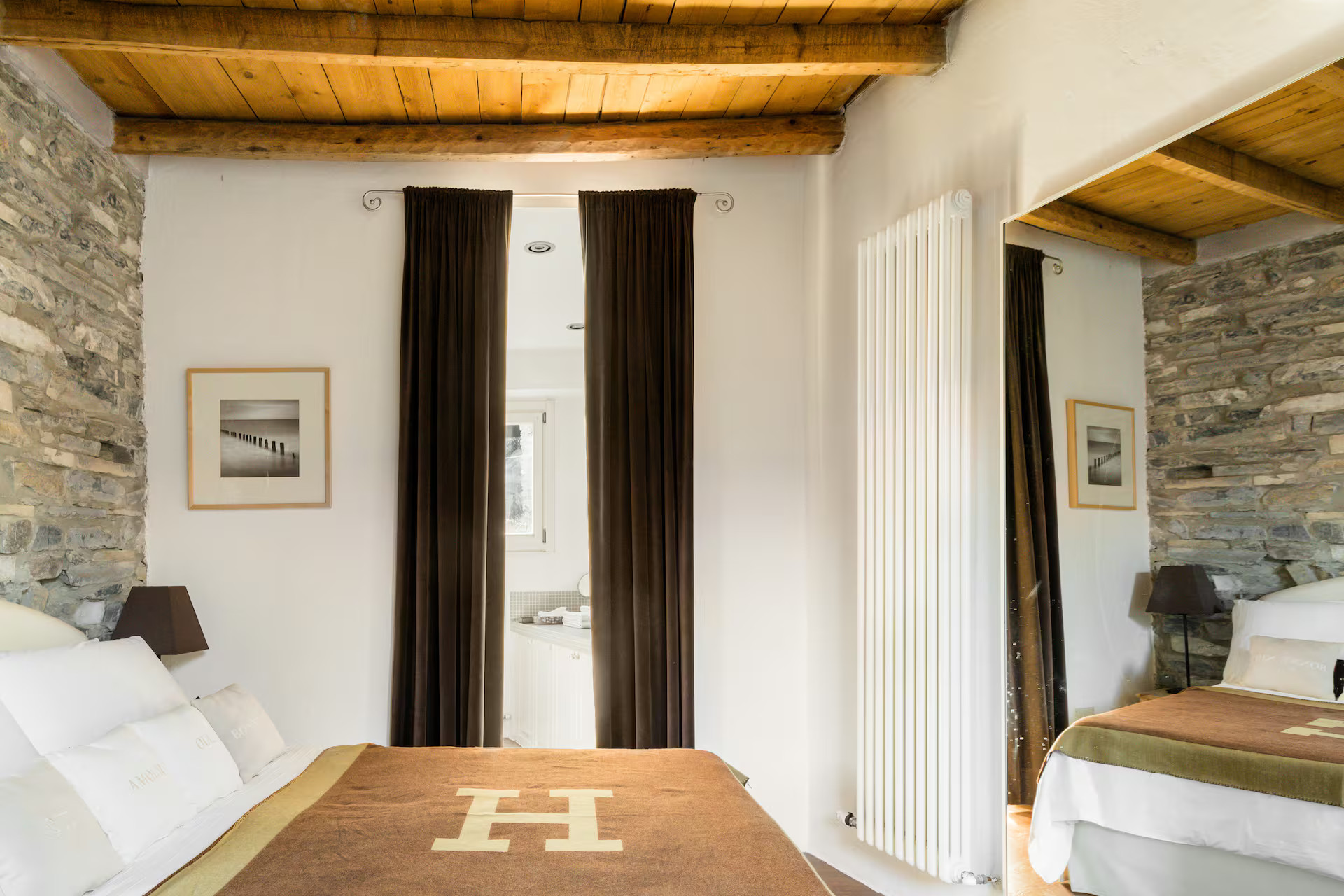 bedroom grey stone walls beams apartment Lake Como rustic chic decor bedroom grey stone walls beams apartment Lake Como rustic chic decor
