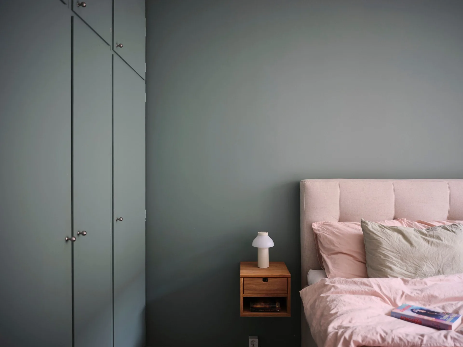 bedroom with green walls vintage style