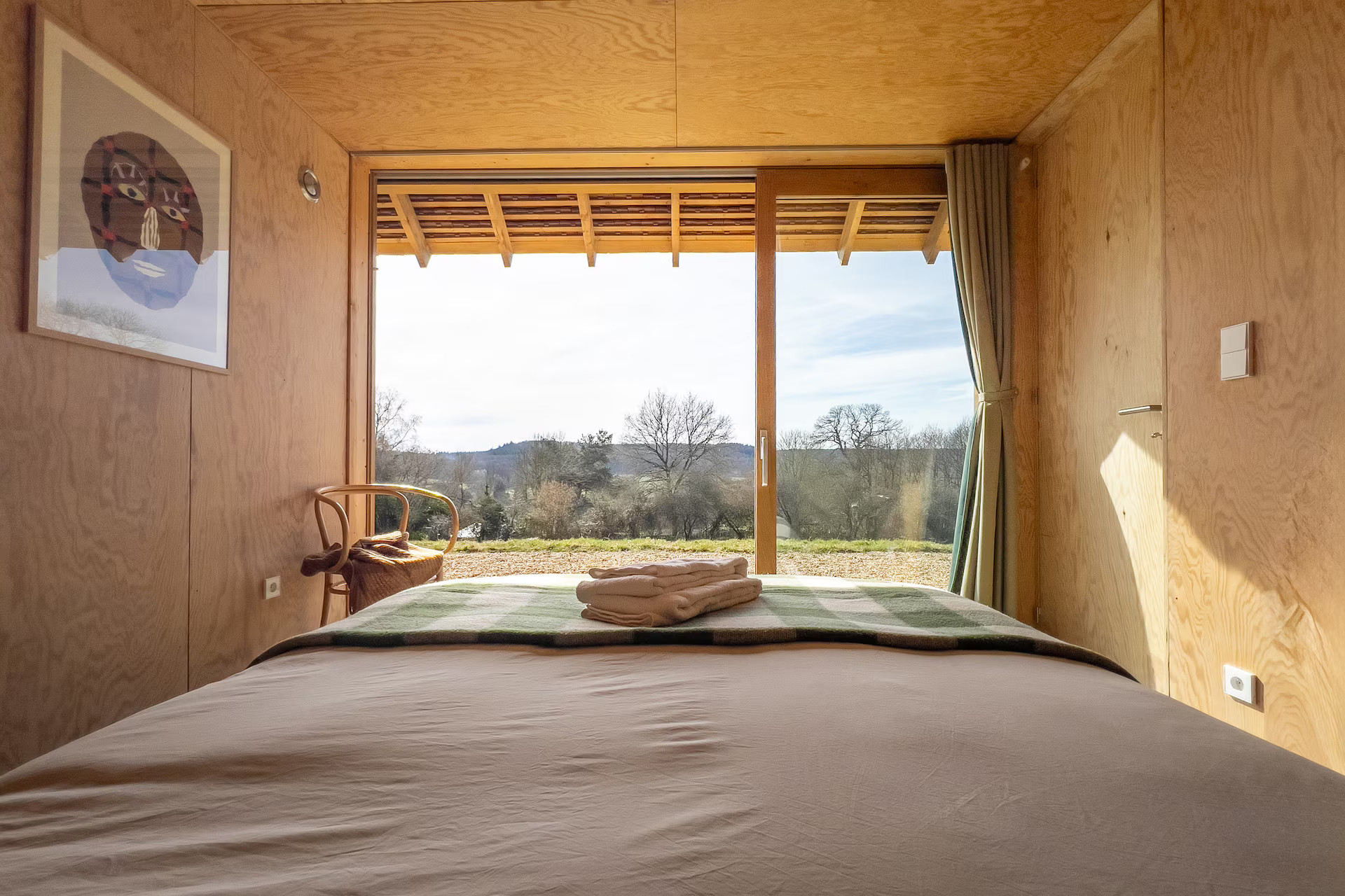 bedroom wood walls bay window