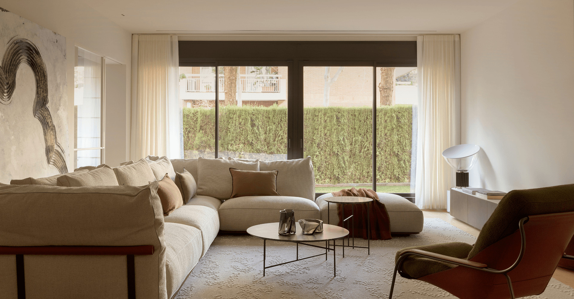 living room natural colours contemporary decor apartment in Barcelona by The Room Studio
