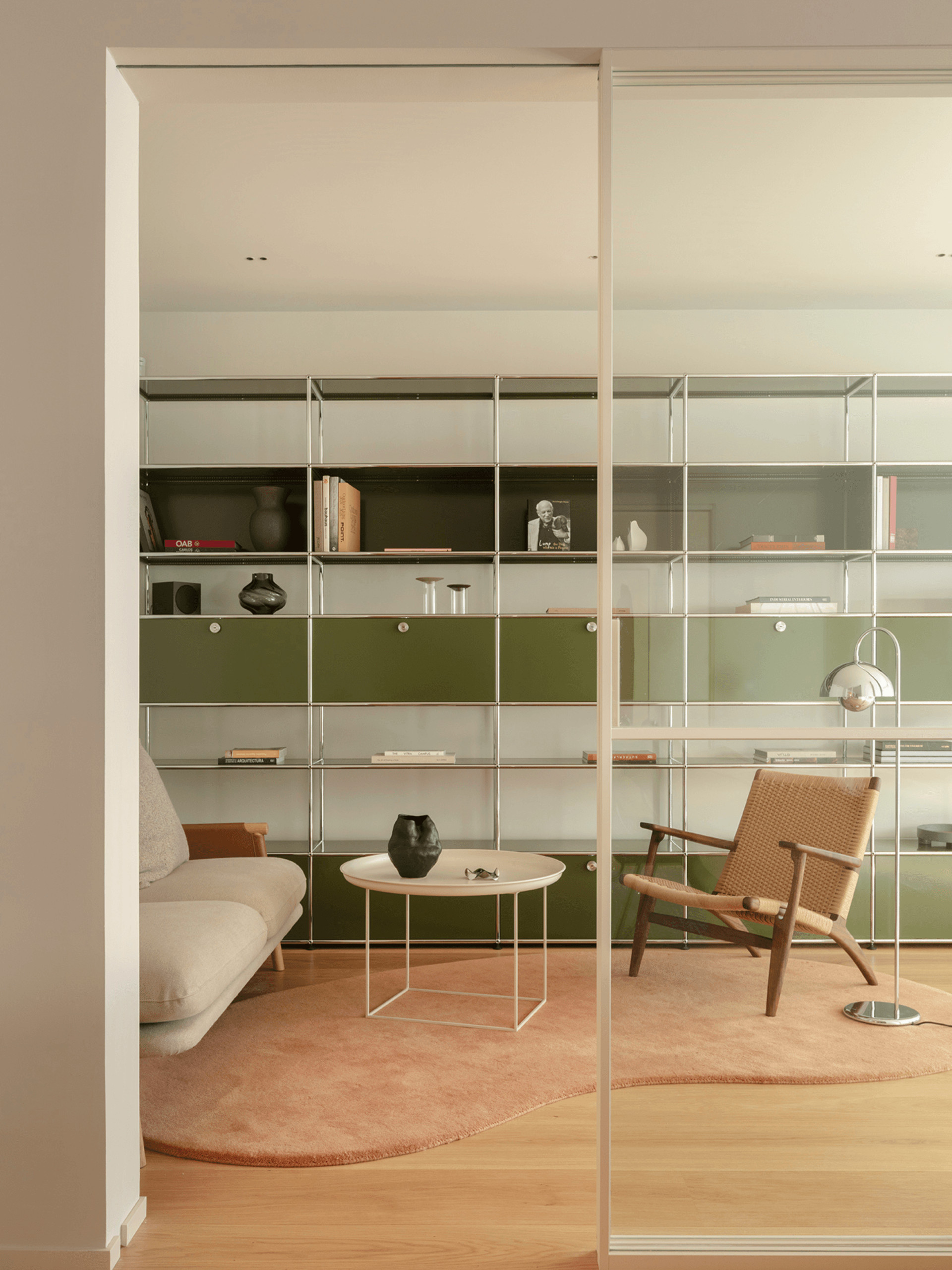 living room with USM Haller furniture contemporary decor apartment in Barcelona by The Room Studio