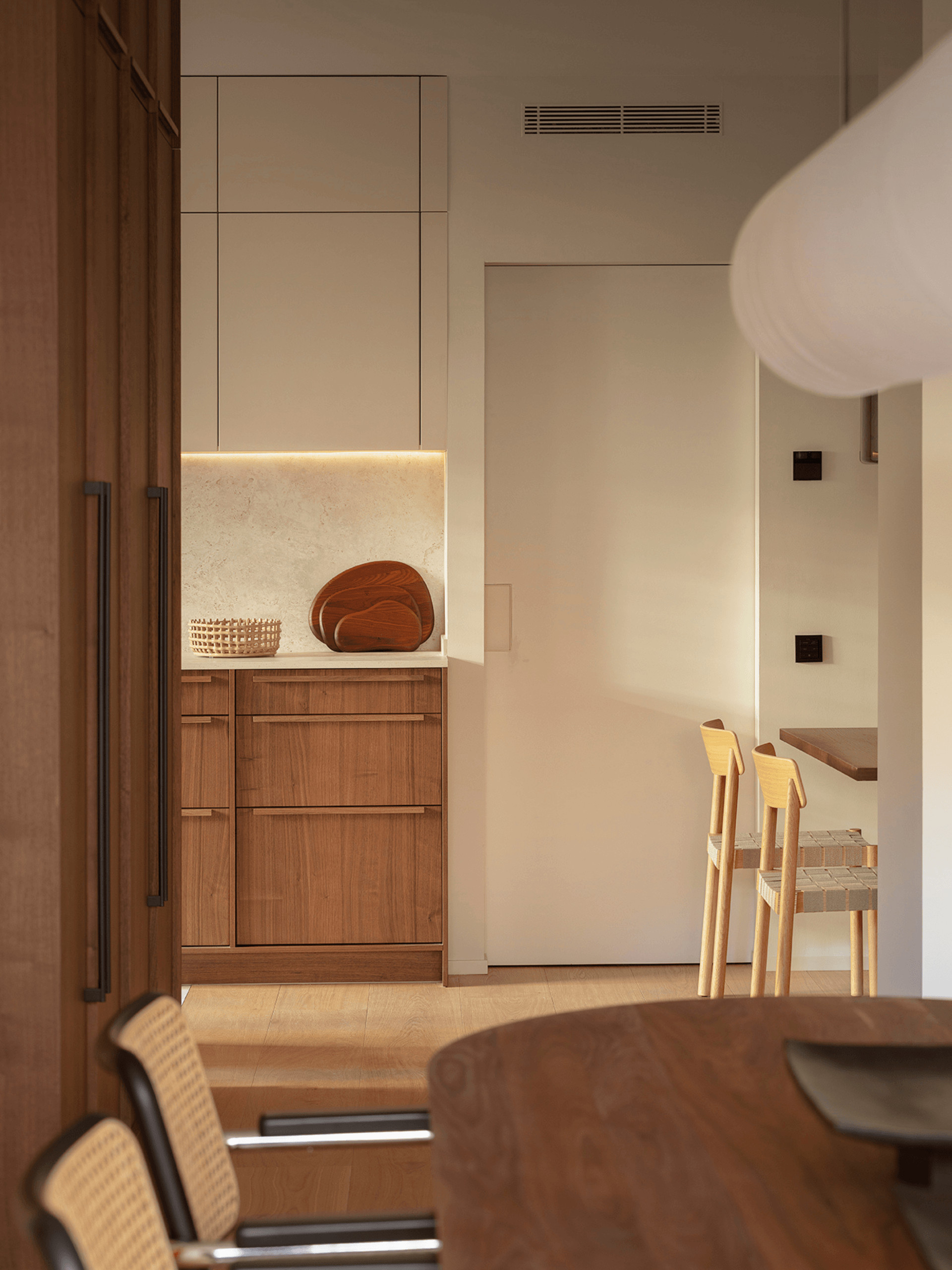 kitchen and dining room with black Cesca chairs contemporary decor apartment in Barcelona by The Room Studio