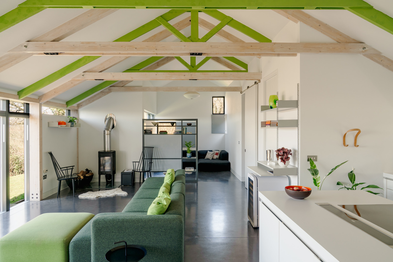 open kitchen and living room concrete floor bay windows contemporary house in Wales "The chicken shed" open kitchen and living room concrete floor bay windows contemporary house in Wales "The chicken shed"