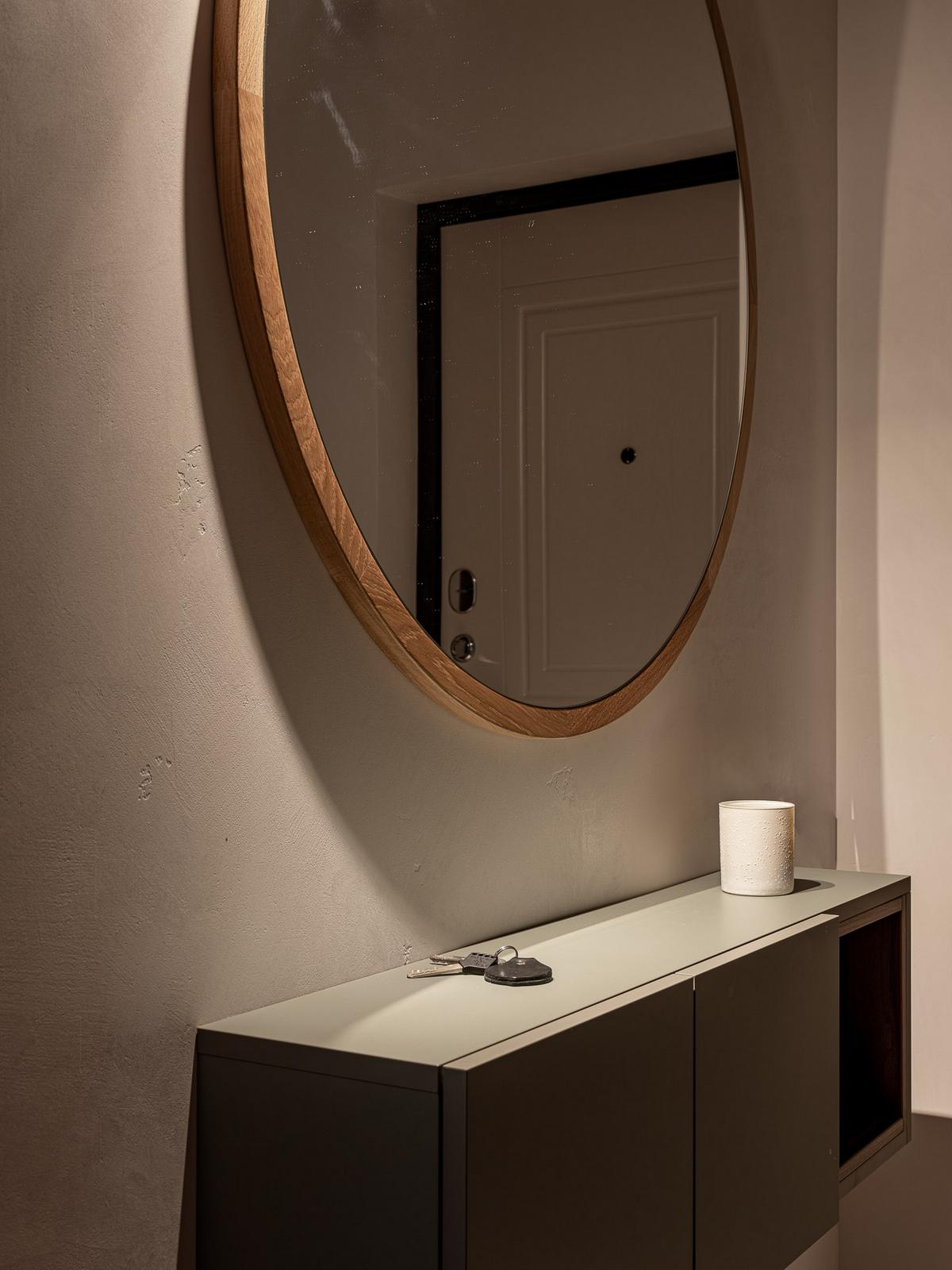 entrée avec console et miroir rond entrée avec console et miroir rond