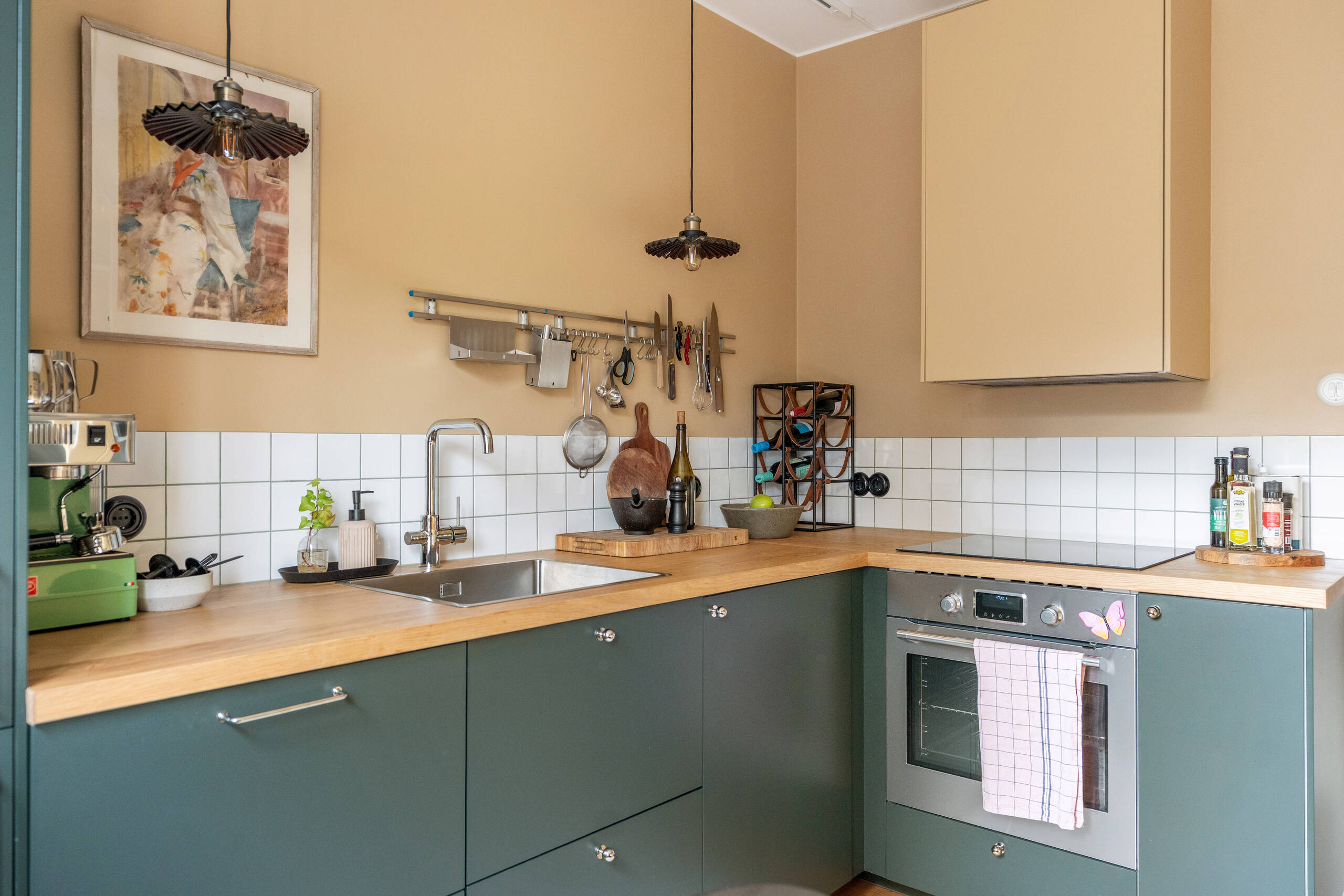 green kitchen with dining room ochre walls